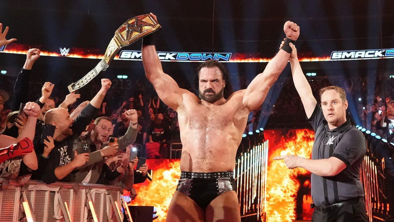 Drew McIntyre celebrates winning the WWE Championship during SmackDown at Uber Arena in Berlin. He became the first British and only Scottish world champion in WWE history when he first won the belt in 2020