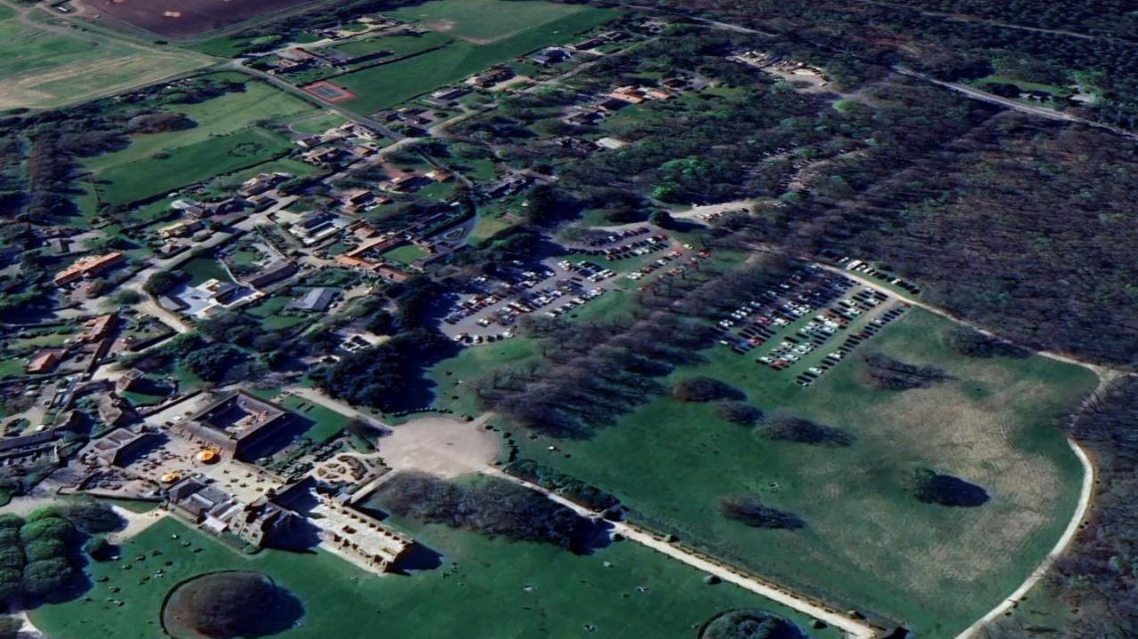 A google earth view of the Rufford site, with the abbey in the foreground, overspill parking to the right and the compound at the top of the picture.