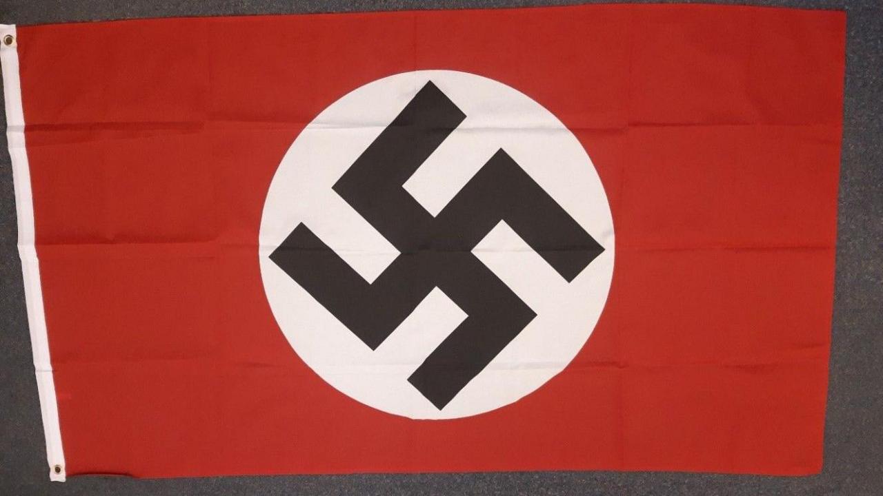 The Nazi Swastika flag carried by Cavan Medlock to the attack 