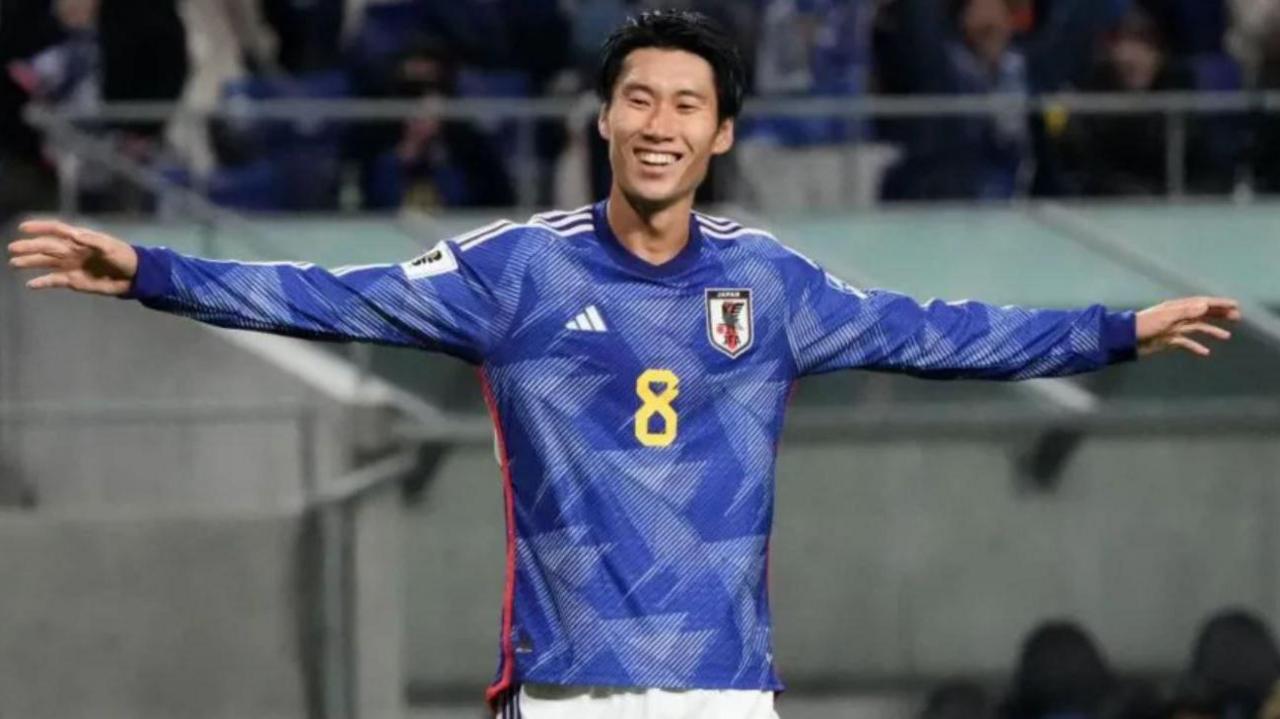 Daichi Kamada celebrates while playing for Japan