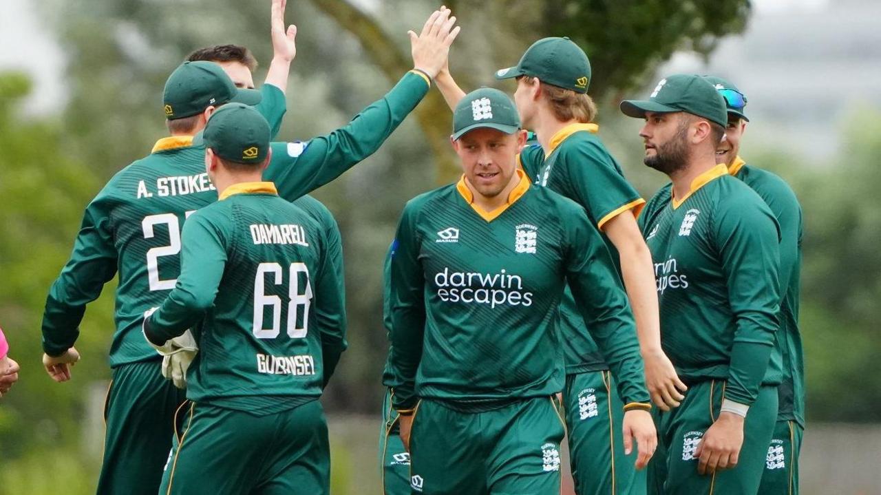 Guernsey celebrate taking a wicket