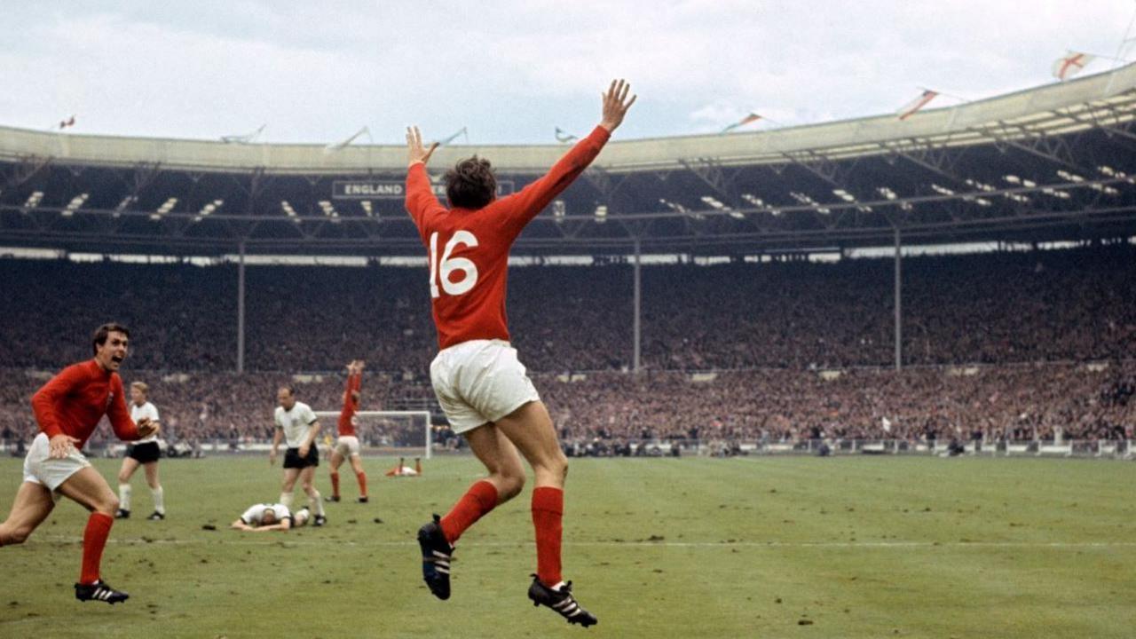 Martin Peters celebrates scoring England's second goal