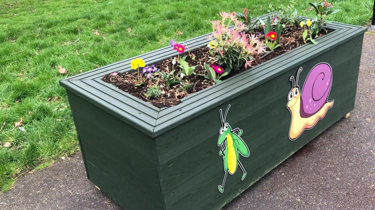 Upcycled bathtub planters