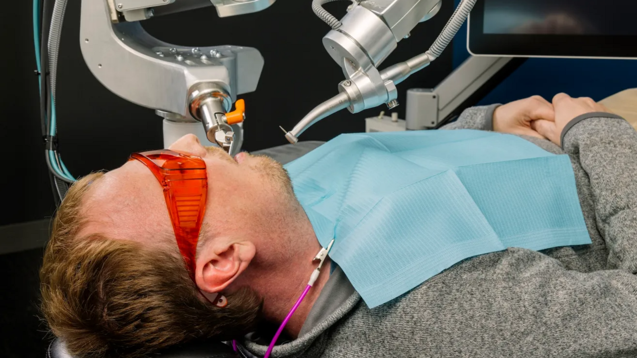 Man being operated on by a robot