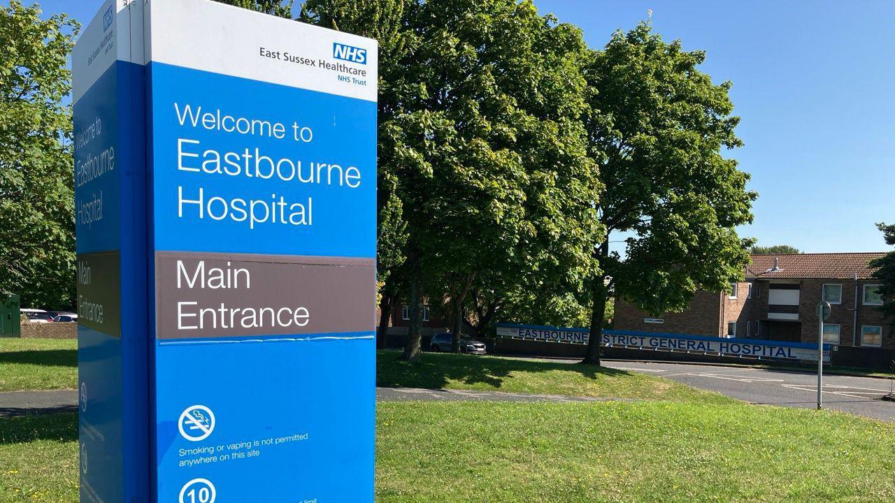 Eastbourne Hospital sign at the entrance to the hospital where the maternity unit has reopened for births