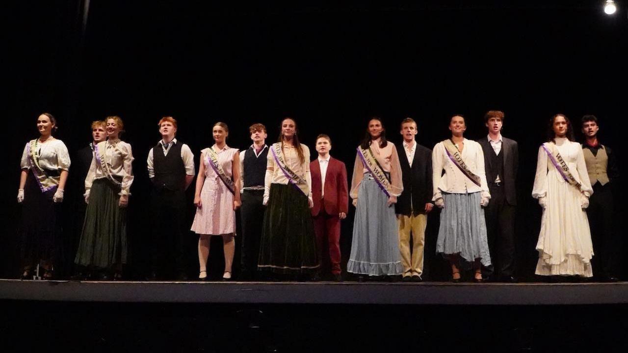 The entire cast of 'Vote' the musical, during a performance at Westbourne House School in Chichester, West Sussex. The cast are stood side by side at the conclusion of the show.