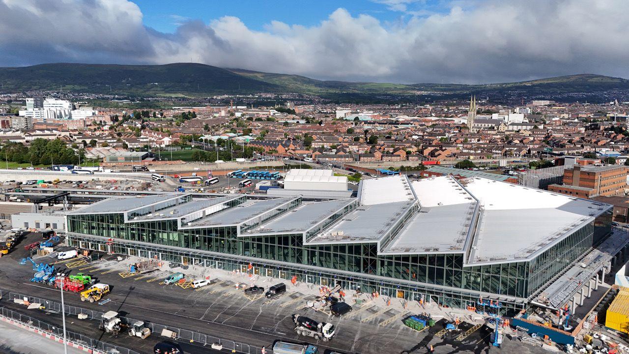 Overhead view of the new transport hub, showing the building and construction work outside