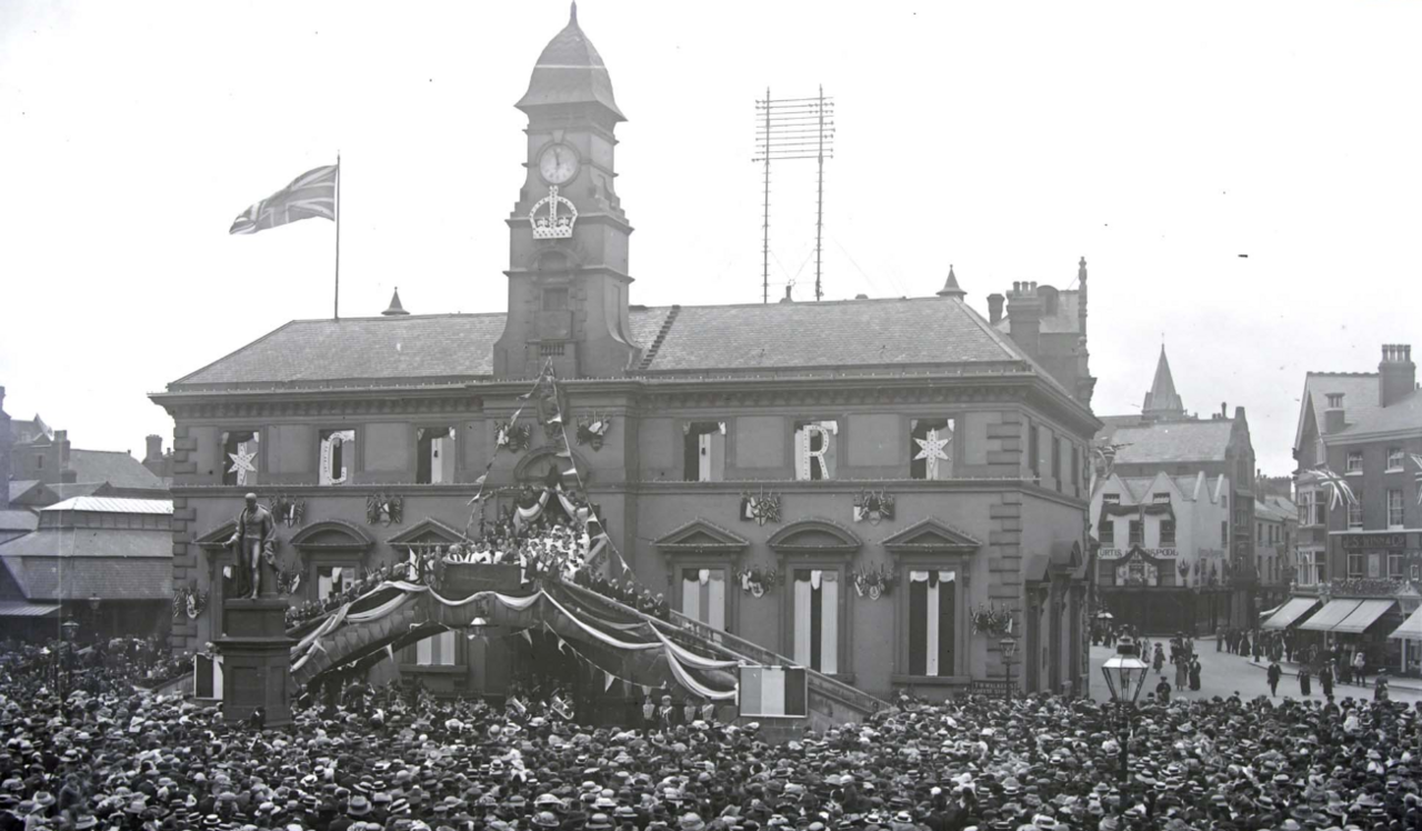 Black and white image of the large crowds at the Corn Exchange