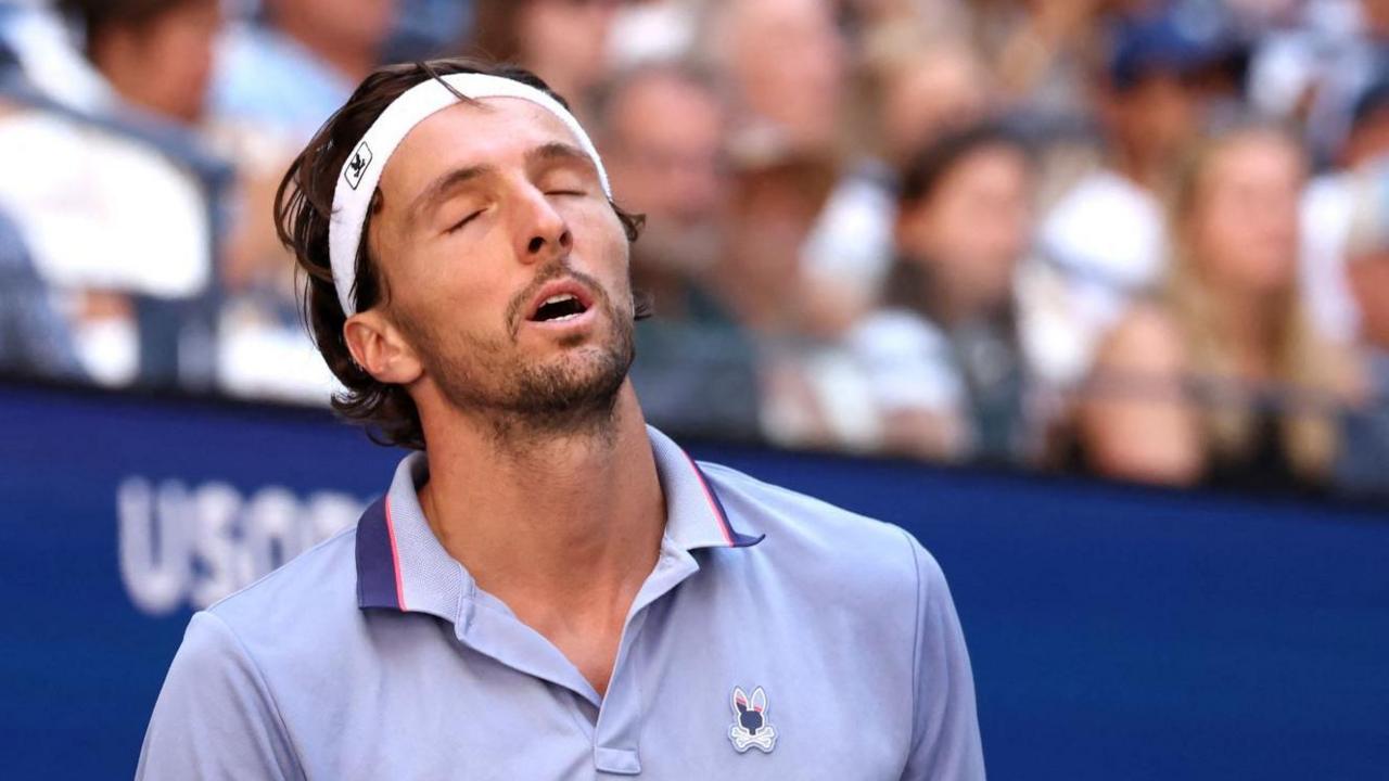 Arthur Rinderknech winces during his 2025 US Open match