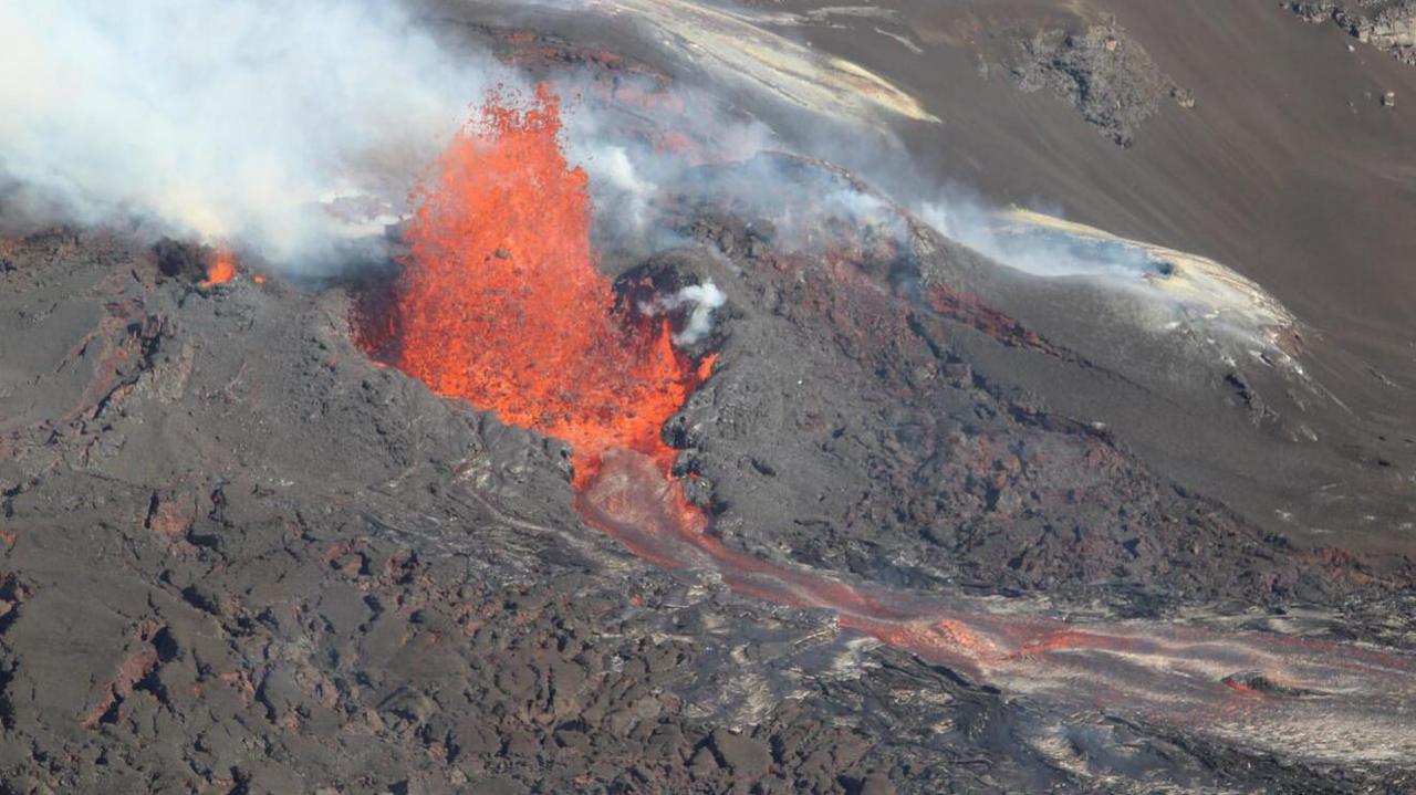 Volcano with a lava fountain shooting out.