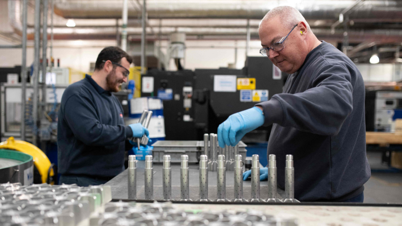 BAE Systems employees work on the tail section of munitions at the BAE Systems factory in Washington, near Newcastle upon Tyne