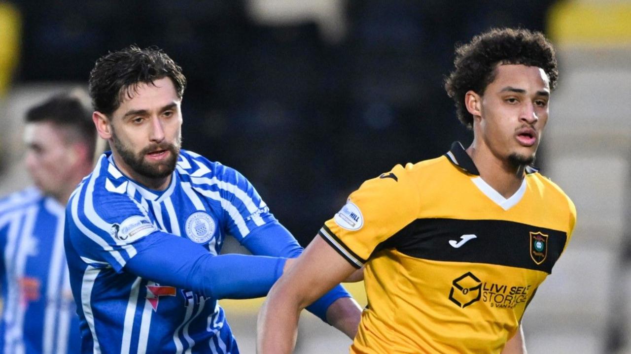 Livingston's Tete Yengi and Kilmarnock's Robbie Deas in action during a William Hill Premiership match between Livingston and Kilmarnock at the Home of the Set Fare Arena