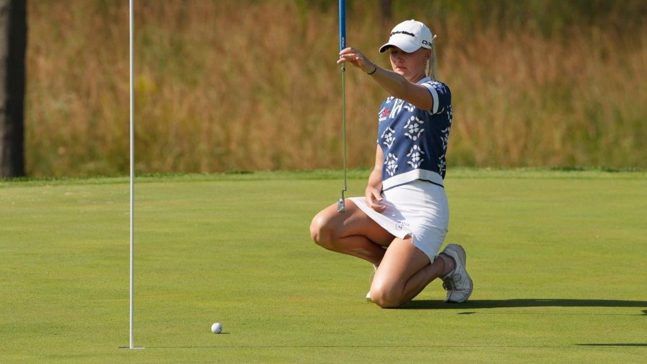 Charley Hull lines up a putt on the 18th green to win her third LPGA Tour event