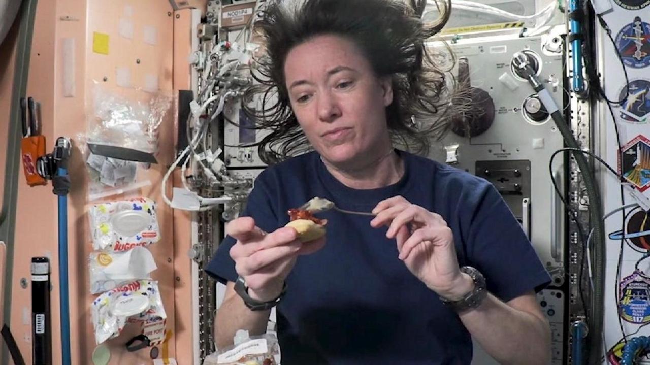 astronaut eating food