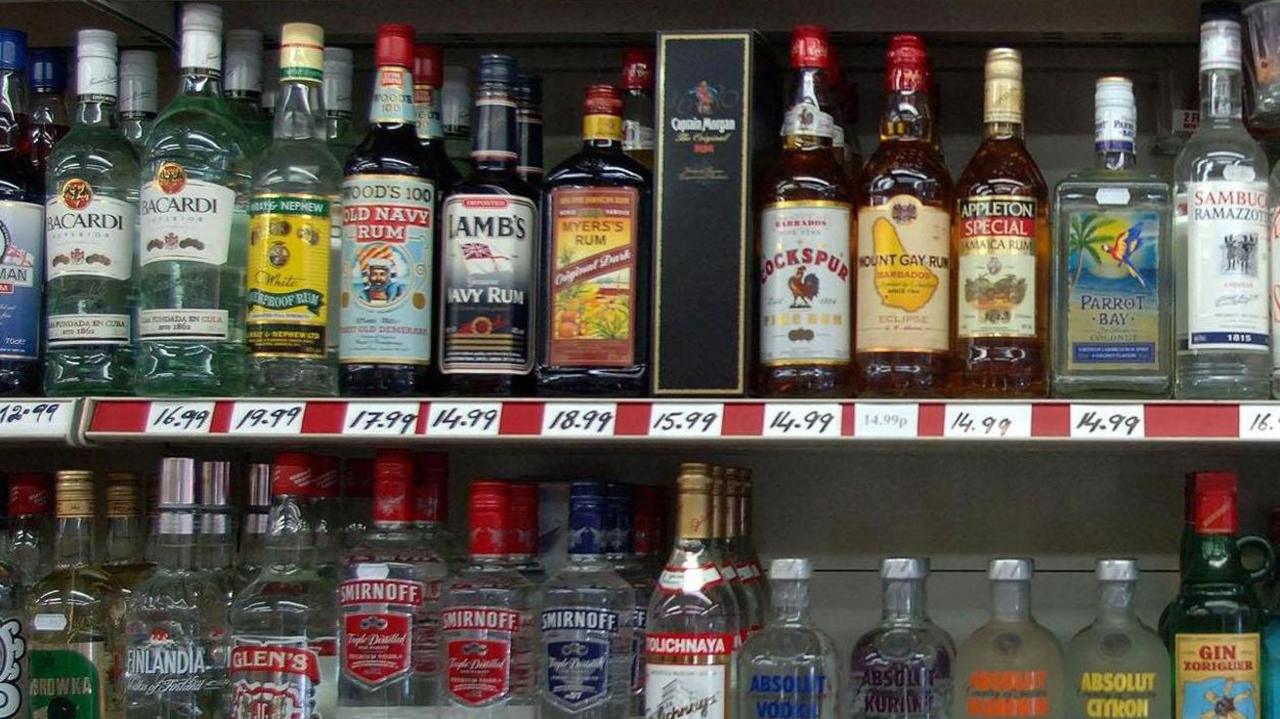 Shelves of bottles of alcohol at a generic off-licence store