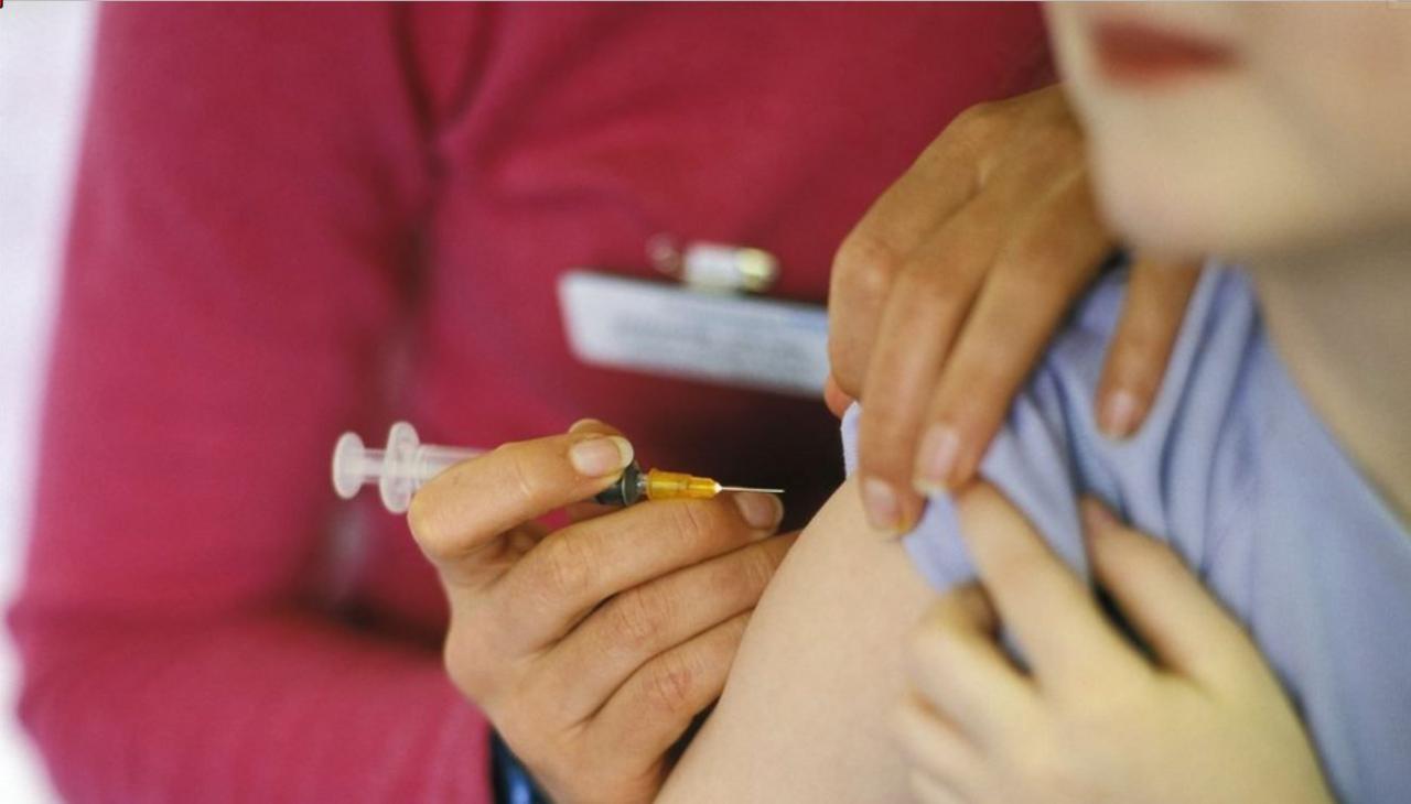 Child having MMR vaccine