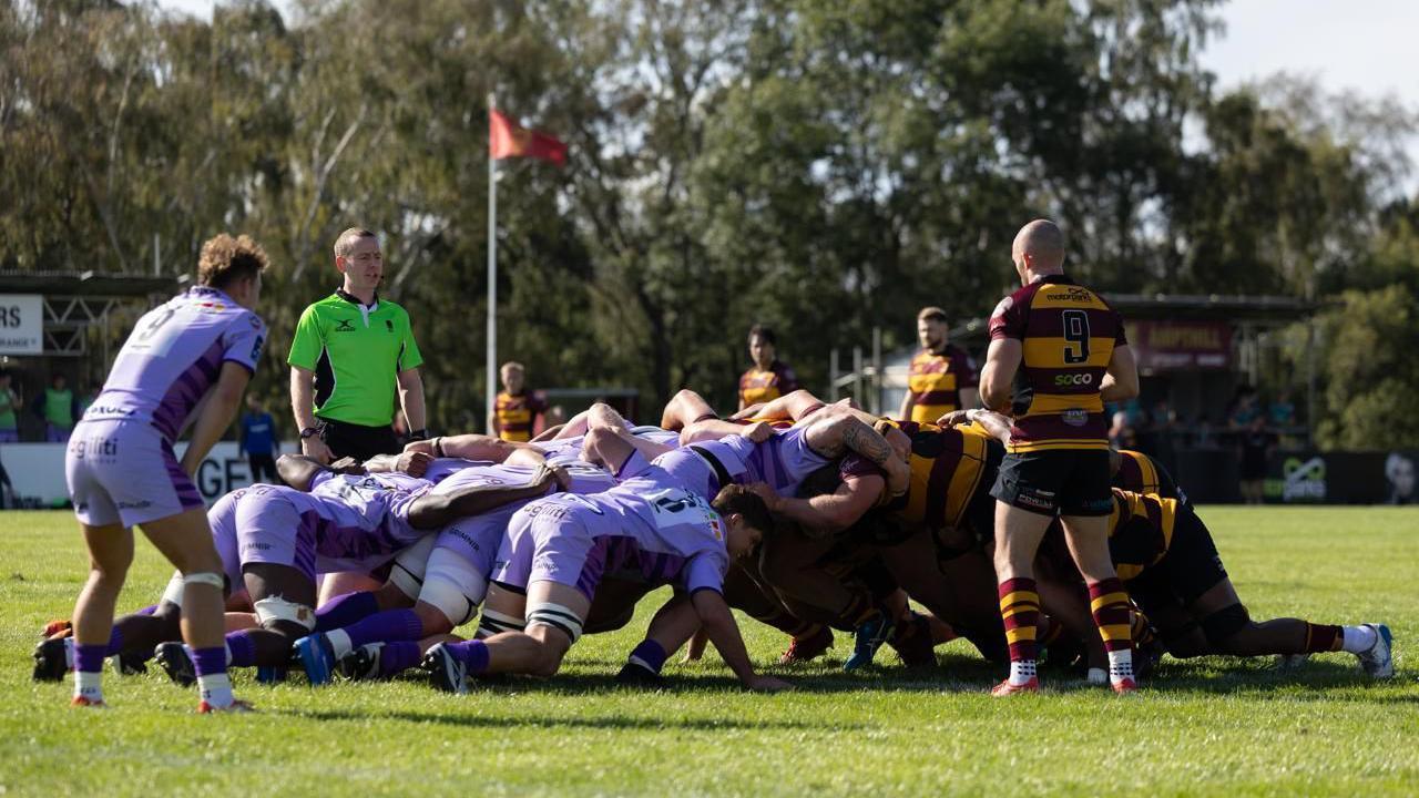 Worcester Warriors and Ampthill players go down for a scrum during a match