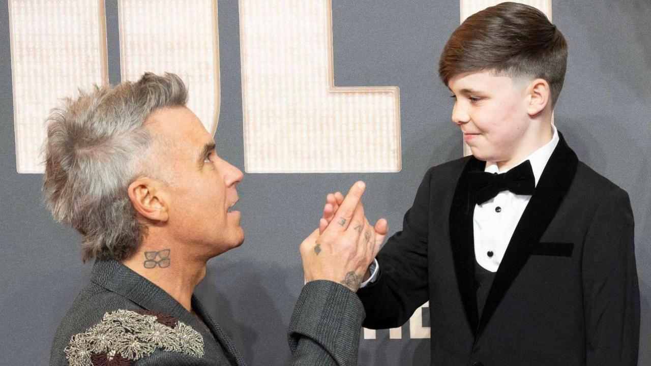 Robbie Williams at the European premiere of his new film Better Man,  Carter J. Murphy and Jonno Davies attending the European premiere for Better Man at Odeon Luxe, Leicester Square, London.