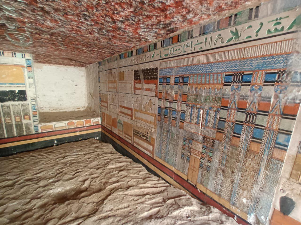 A tomb with decorated walls, which is a type of flat-roofed structure often used to mark the burials of important ancient Egyptians.