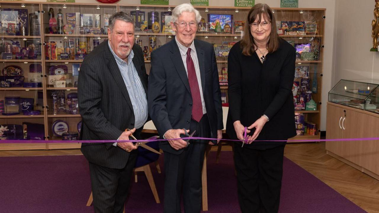 Professor Carl Chinn MBE, Duncan Cadbury and Sarah Foden cutting the ribbon