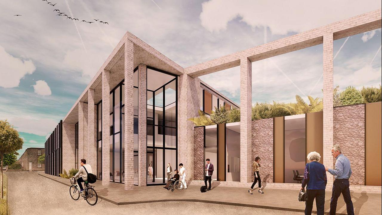 An artist's impression of how the new Berwick hospital would look. It shows a two-storey brick building with pillars, a lot of glass and a section with a roof garden.
