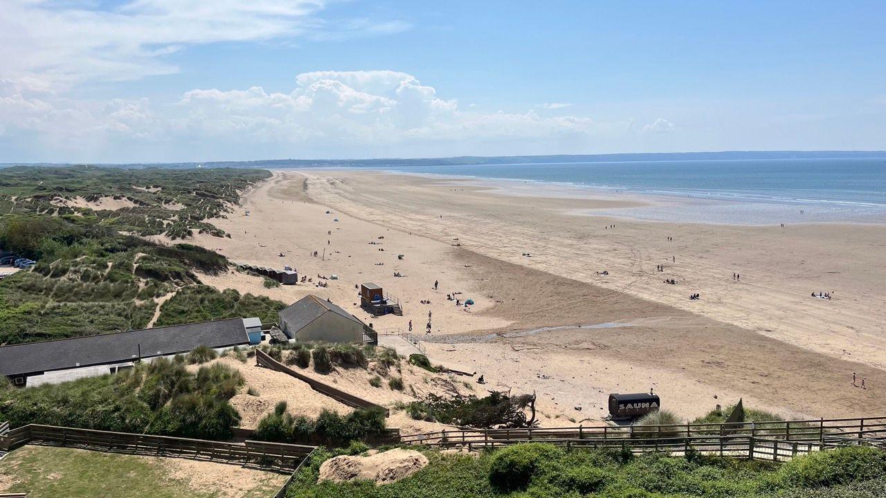 Saunton Sands seen from an elevated point at the north end of the beach with the view stretching to the opeing of the Taw Estuary