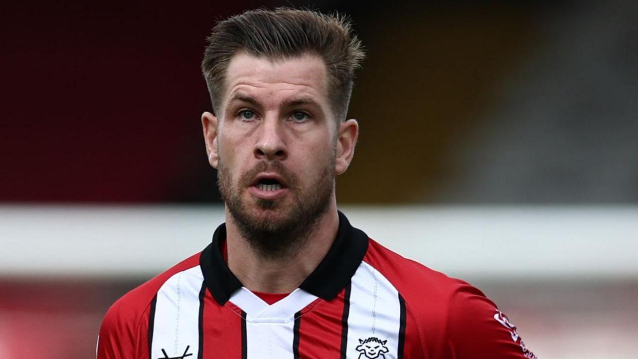 James Collins in action for Lincoln