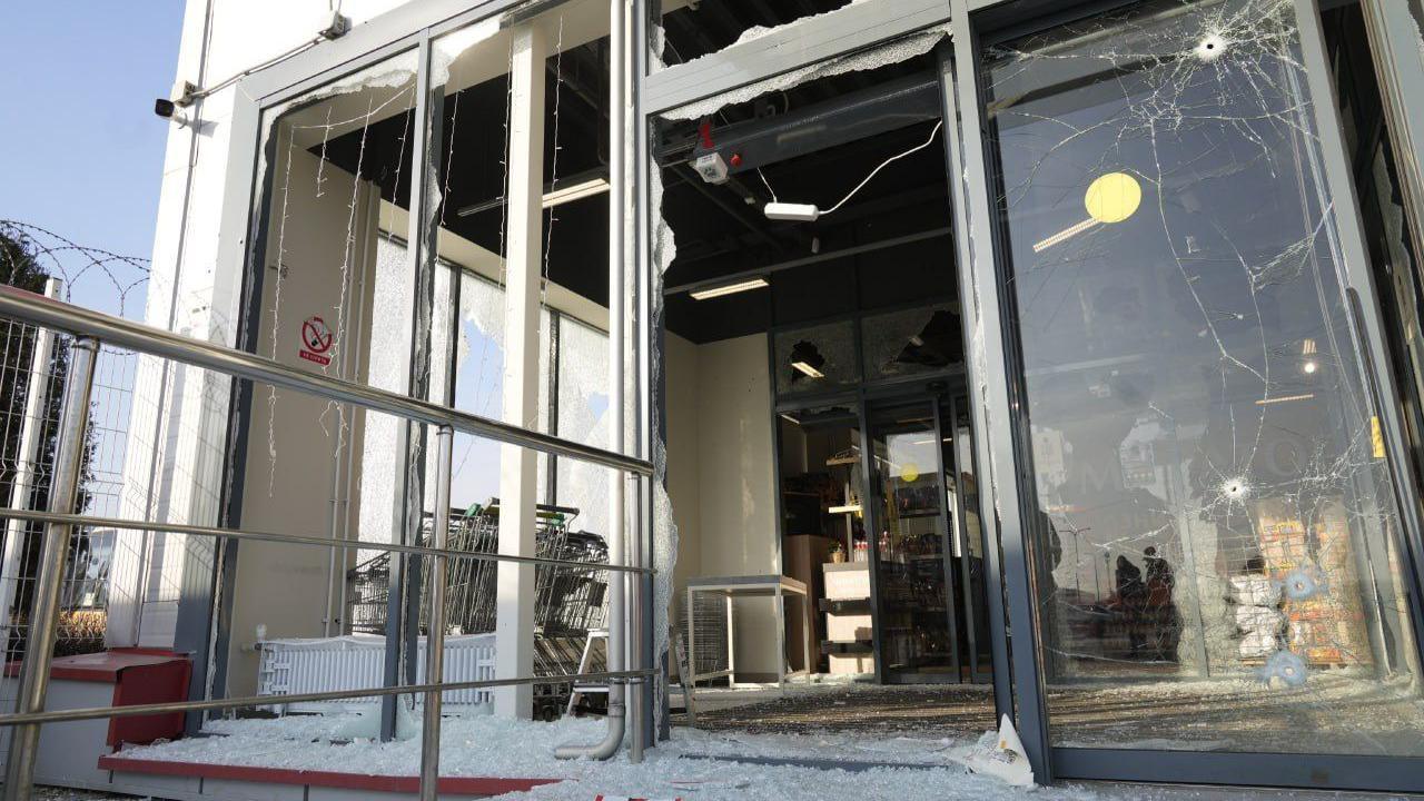 A photo purportedly showing damage to a food store in Russia, caused by a drone strike which reportedly killed two.