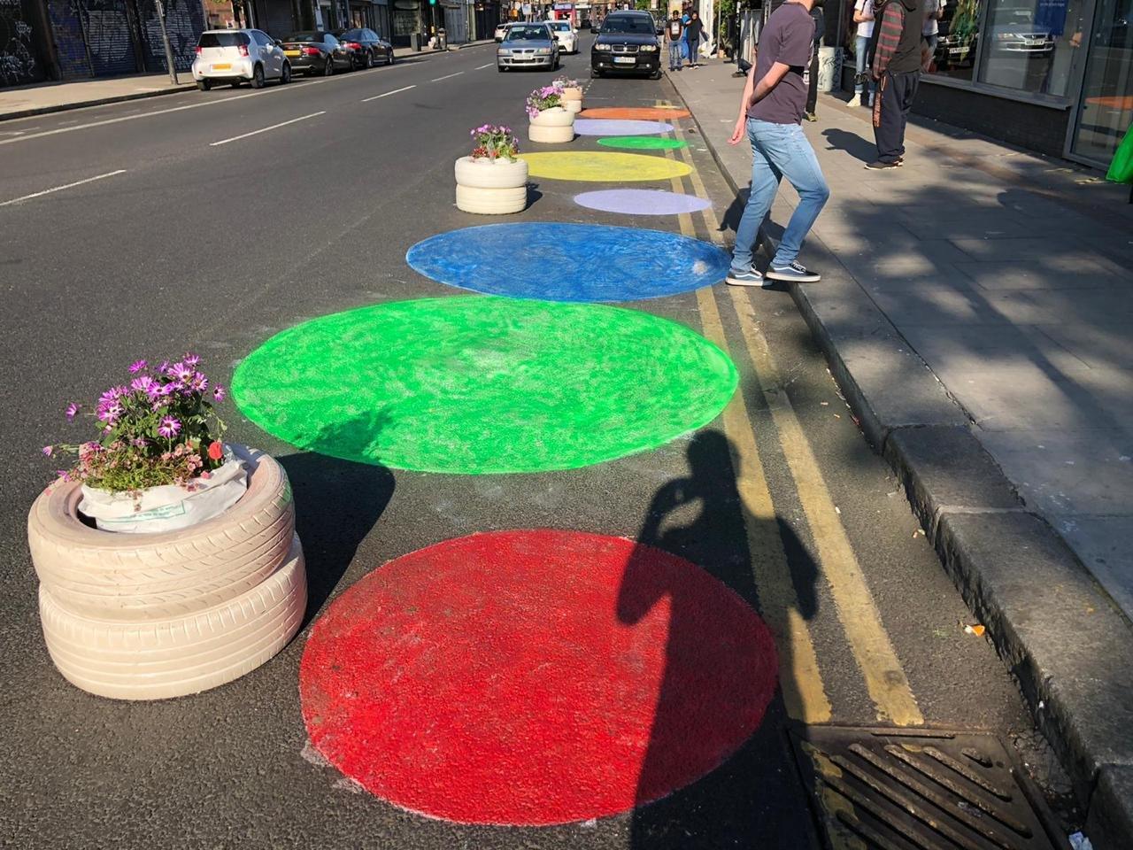 Frustrated at the lack of space to queue, a group of women widened a London pavement themselves