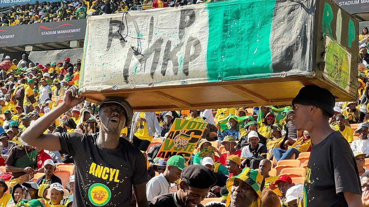 ANC supporters carrying coffin