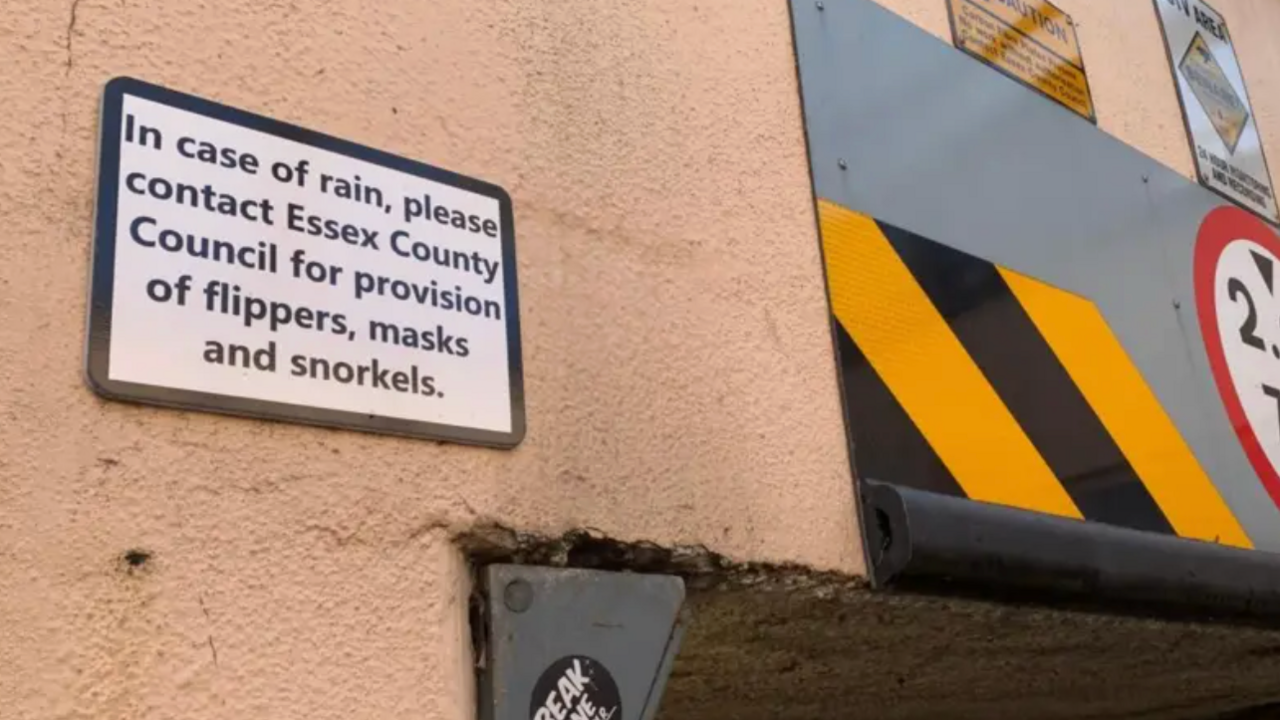 Sign showing 'In case of rain, please contact Essex County Council for provision of flippers, masks and snorkels