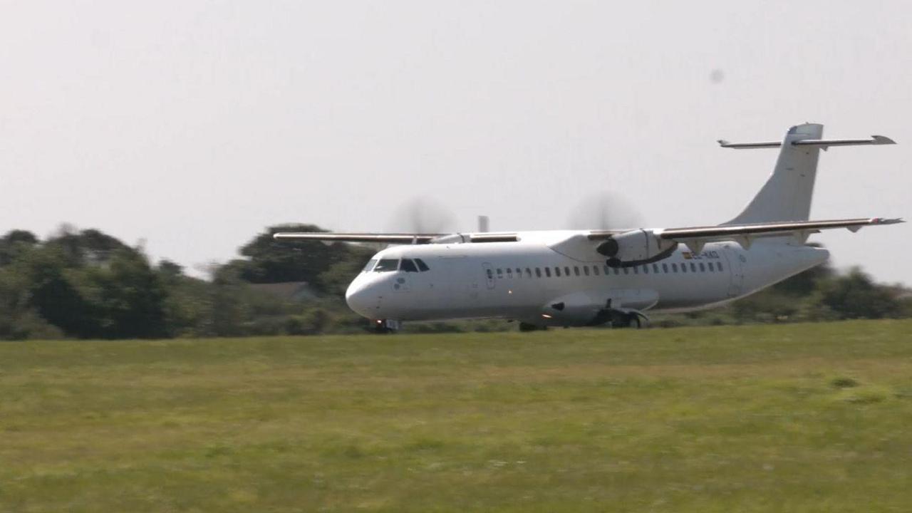 The ATR wet-leased by Aurigny on the runway at Guernsey Airport.