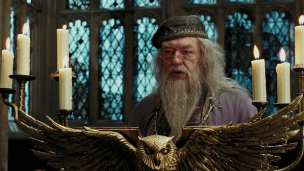 Dumbledore standing at an owl lecturn, an image taken from the Harry Potter movie.