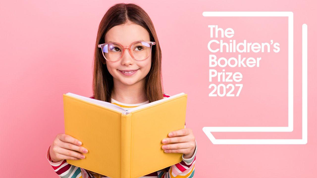 a girl reading a book with the children's booker prize logo