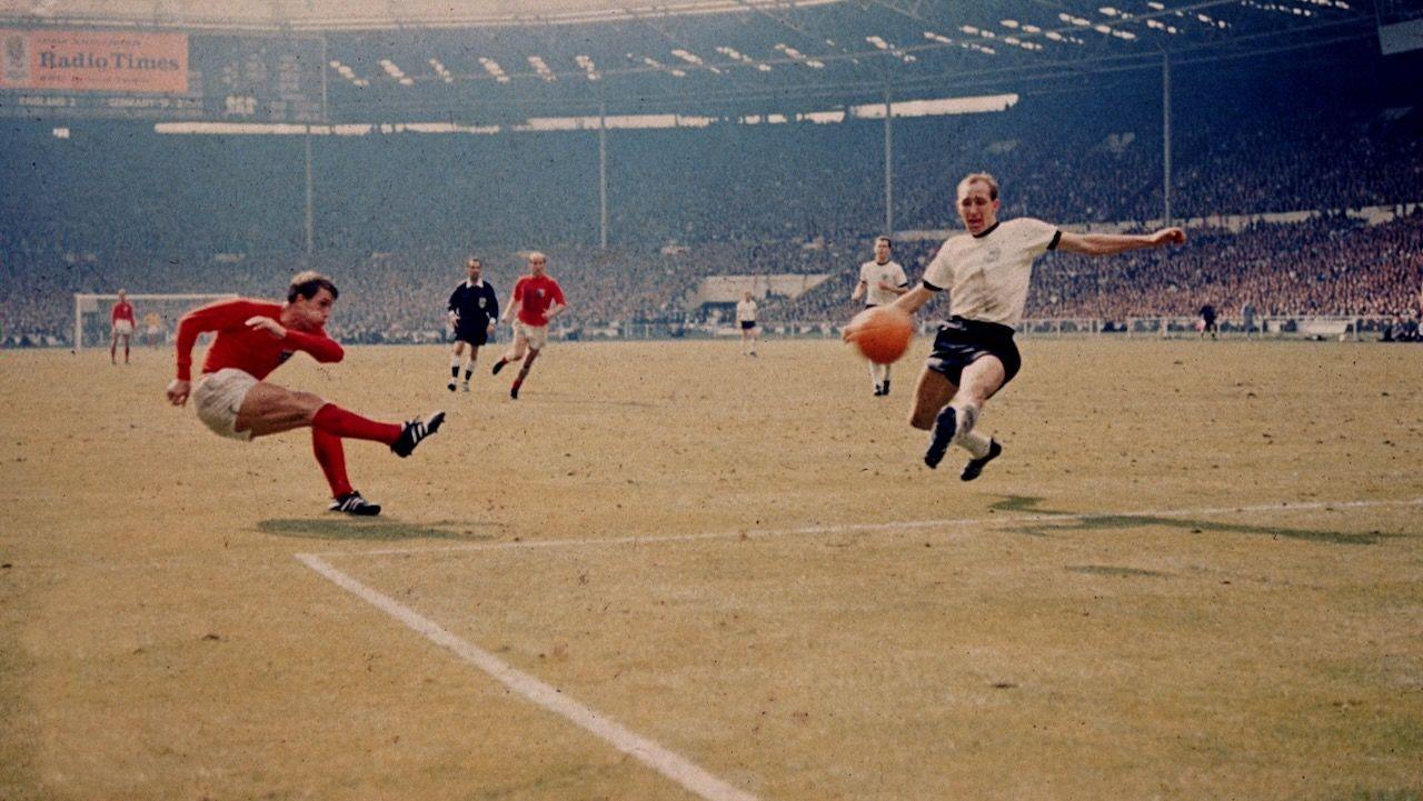Geoff Hurst scoring England's third goal against West Germany in the World Cup final at Wembley Stadium.
