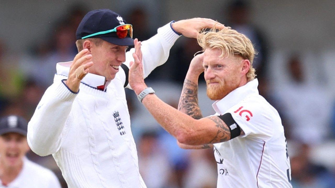 Ben Stokes celebrates a wicket with Zak Crawley, both men are high-fiving