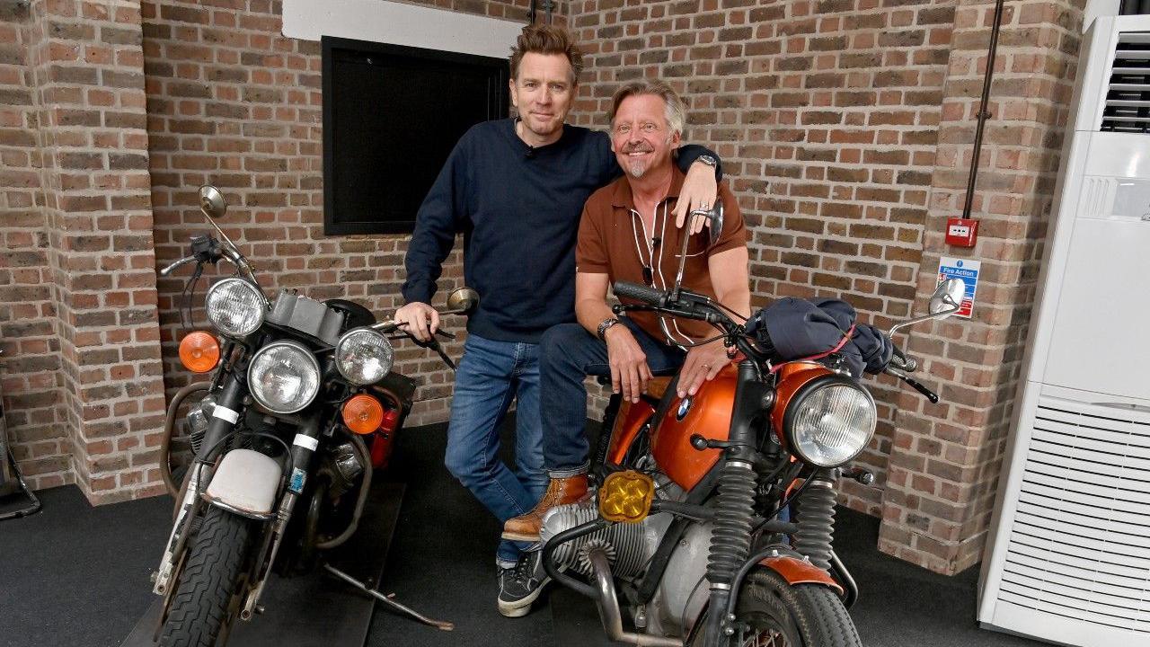 Actor Ewan McGregor and TV presenter Charley Boorman with two motorbikes