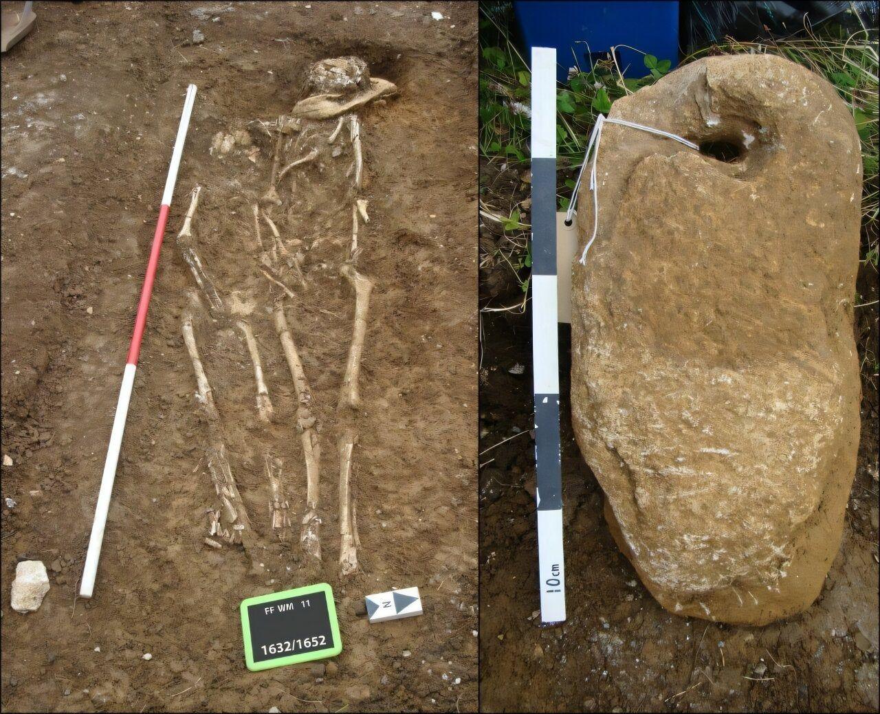 An image of two skeletons in a grave.