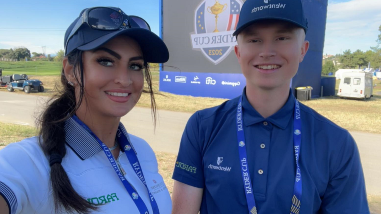 Anna with a golfer at the Ryder Cup in Italy in 2023.