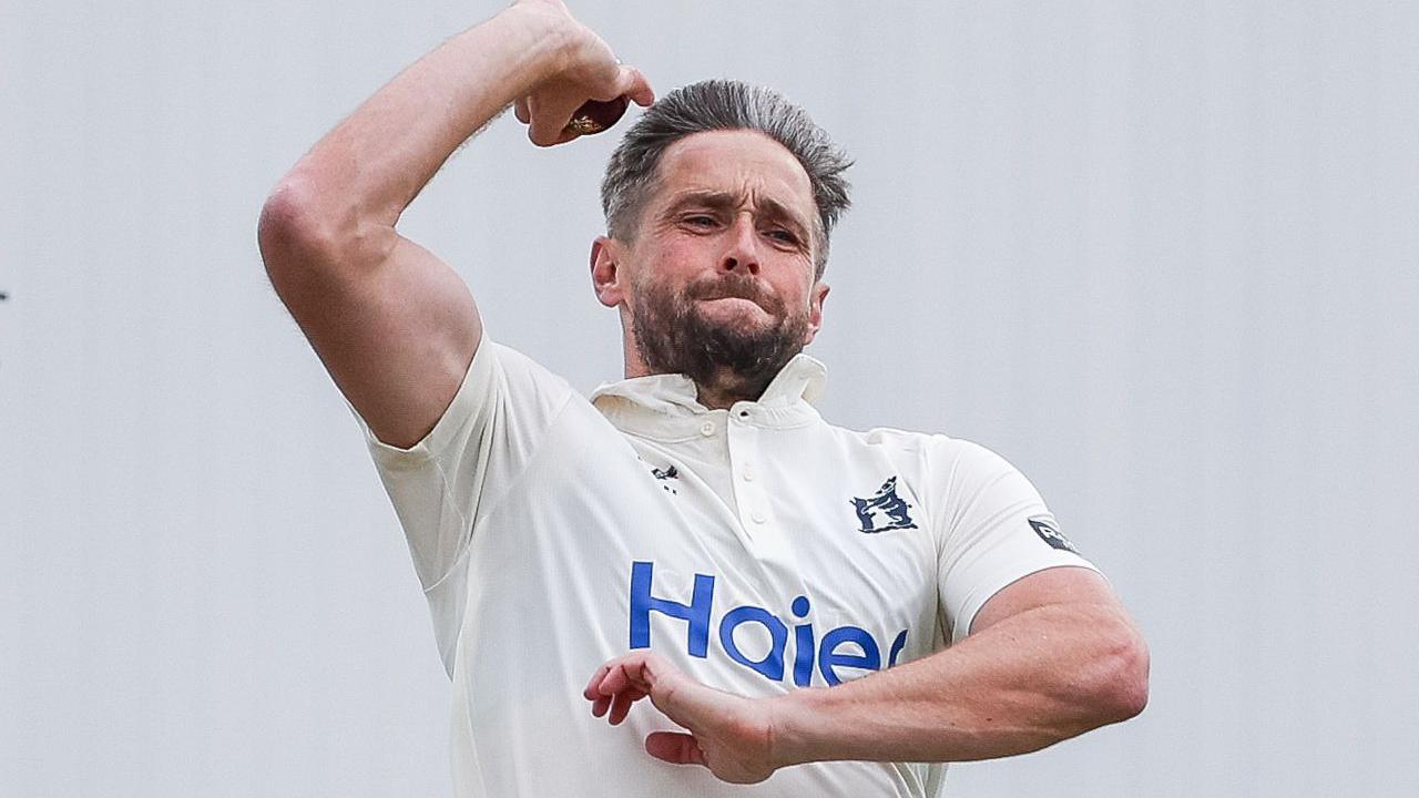 Chris Woakes puffs out his cheeks with his right arm raised and ball in hand as he goes through his bowling action during the MCC University Matches between Warwickshire and Durham University at Edgbaston on 24 March 2026