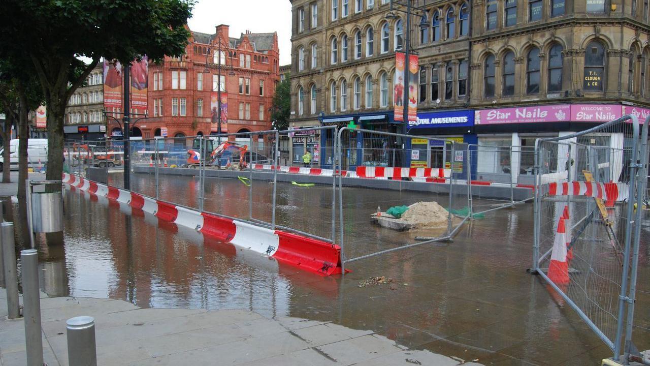 Water from the burst main spilled over from Bridge Street to Market Street in the city centre 