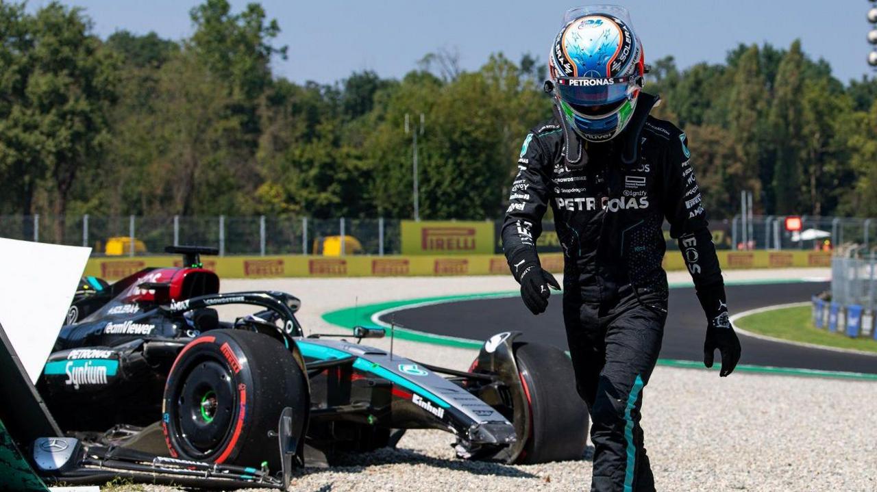 Andrea Kimi Antonelli strides away from his car after crashing