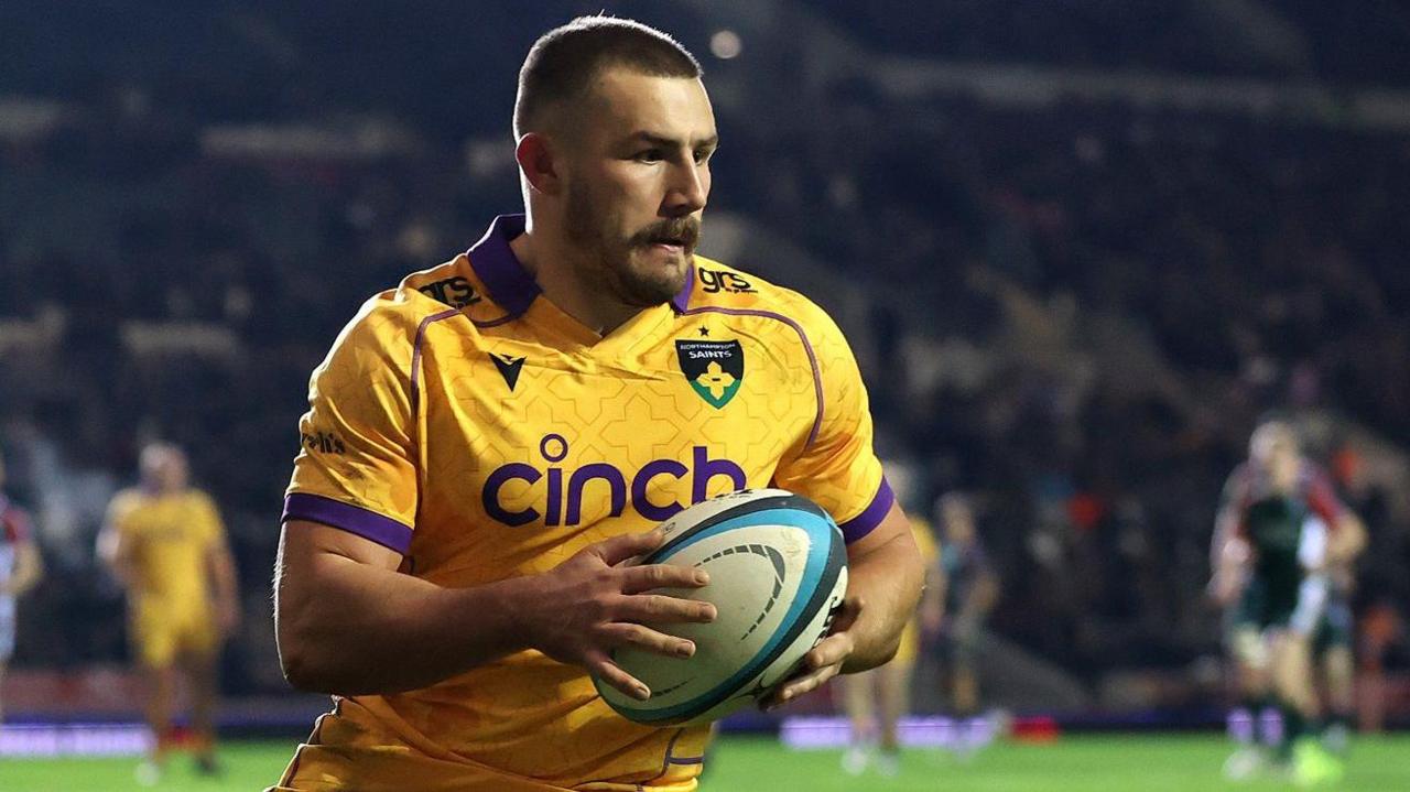 Ollie Sleightholme playing for Northampton