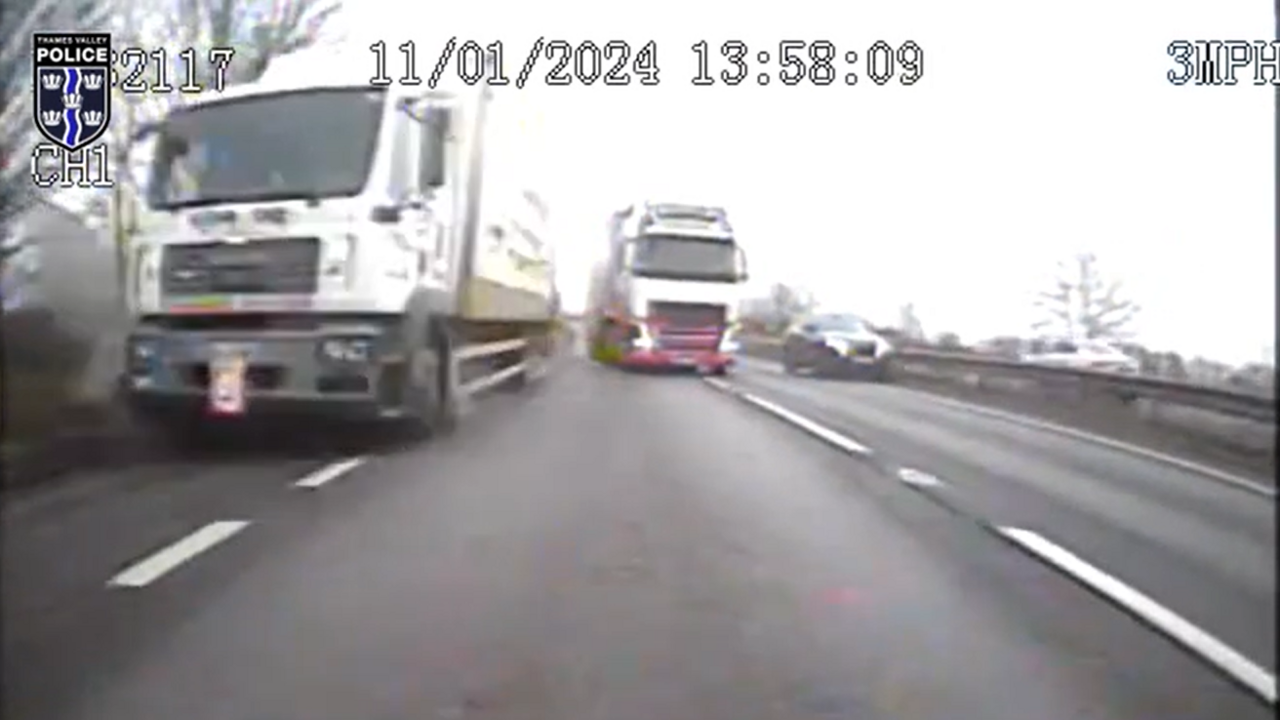 Hosker's truck careering off the road, with a lorry and another car driving behind the vehicle that's taking the footage.