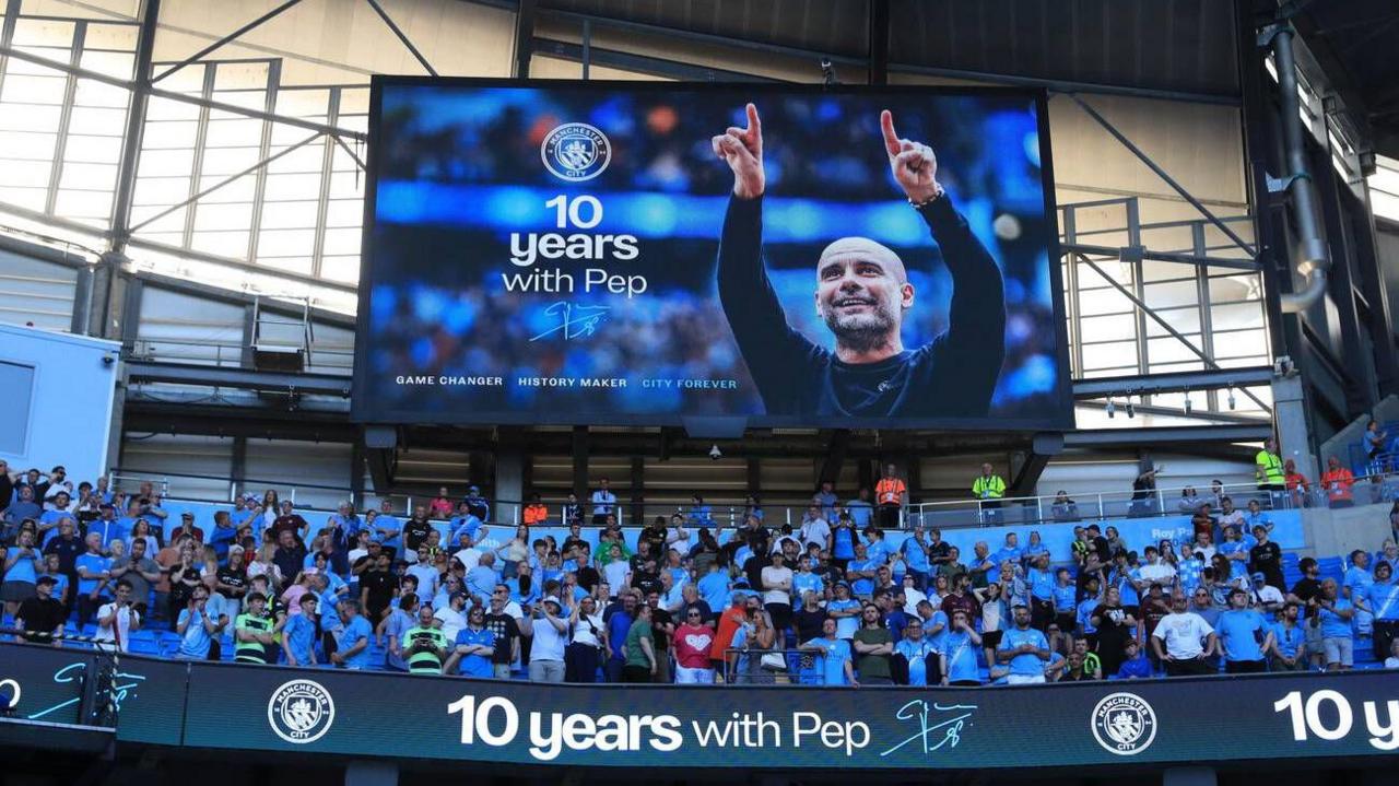 A billboard at the Etihad Stadium that reads "10 years with Pep"