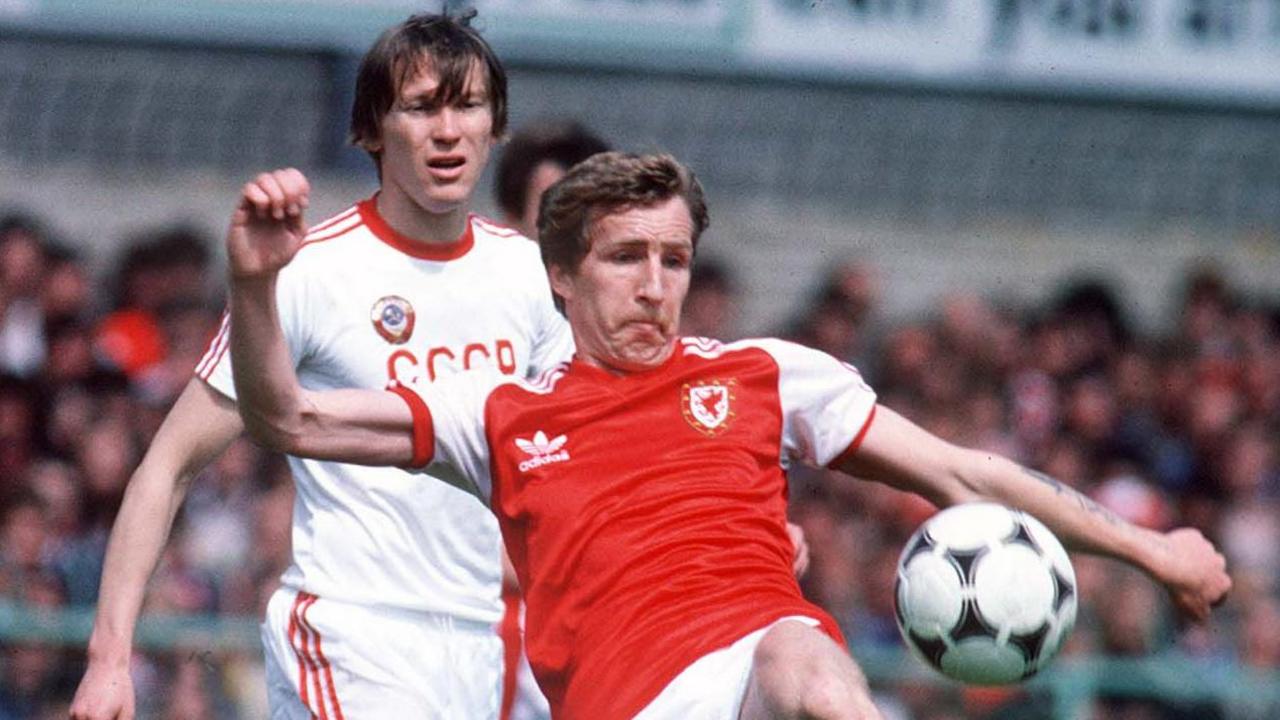 Joey Jones in action for Wales in May 1981 - closely watched by his Soviet opponent Oleg Blokhin