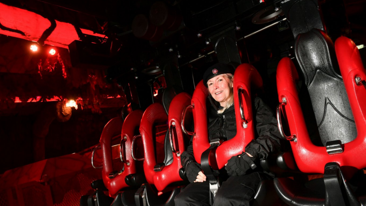 Jackie Smith strapped into a rollercoaster seat