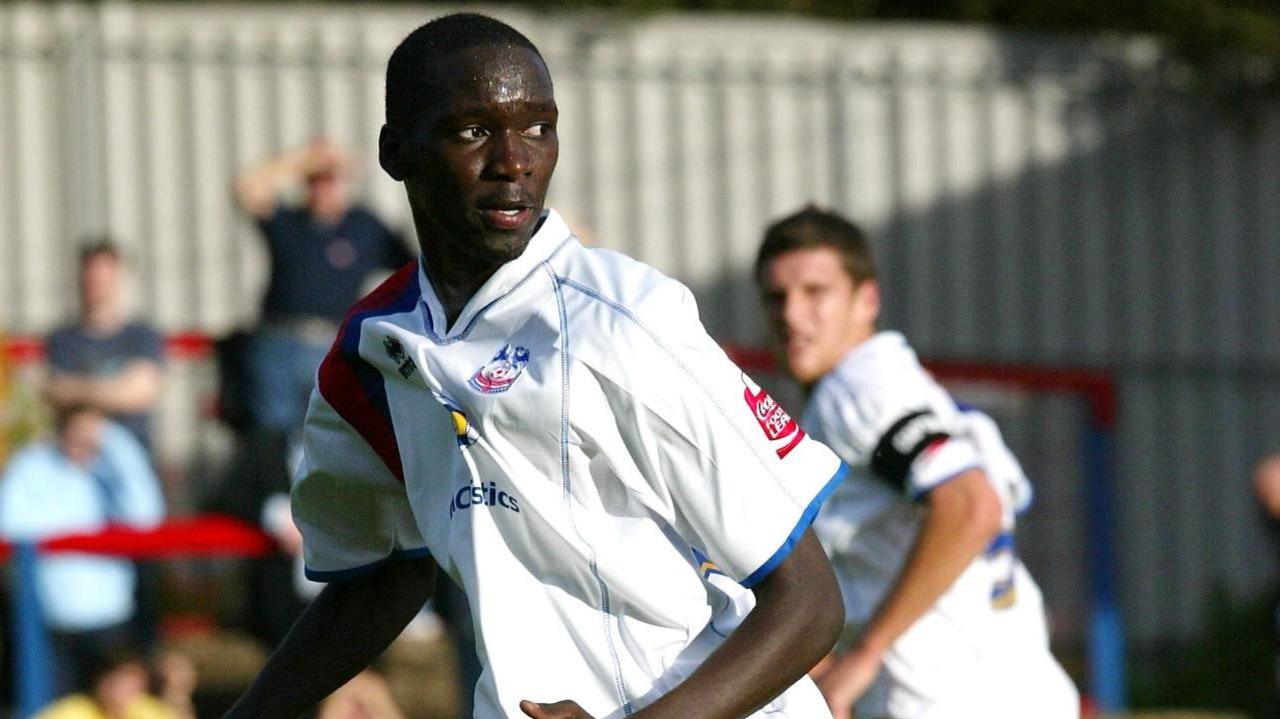 Moses Swaibu looks over his shoulder while playing for Crystal Palace in a friendly