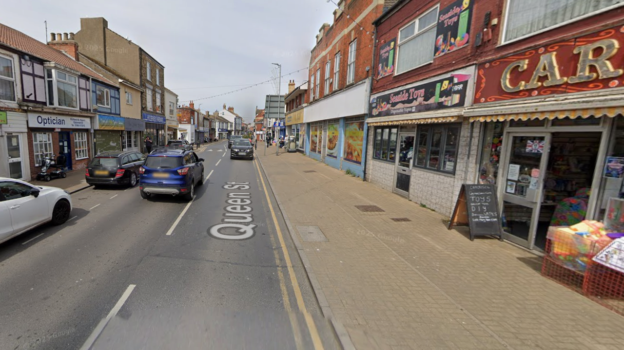 Queen Street in Withernsea. It is a busy road with businesses on either side. The picture shows one of the wide pavements which is to be improved