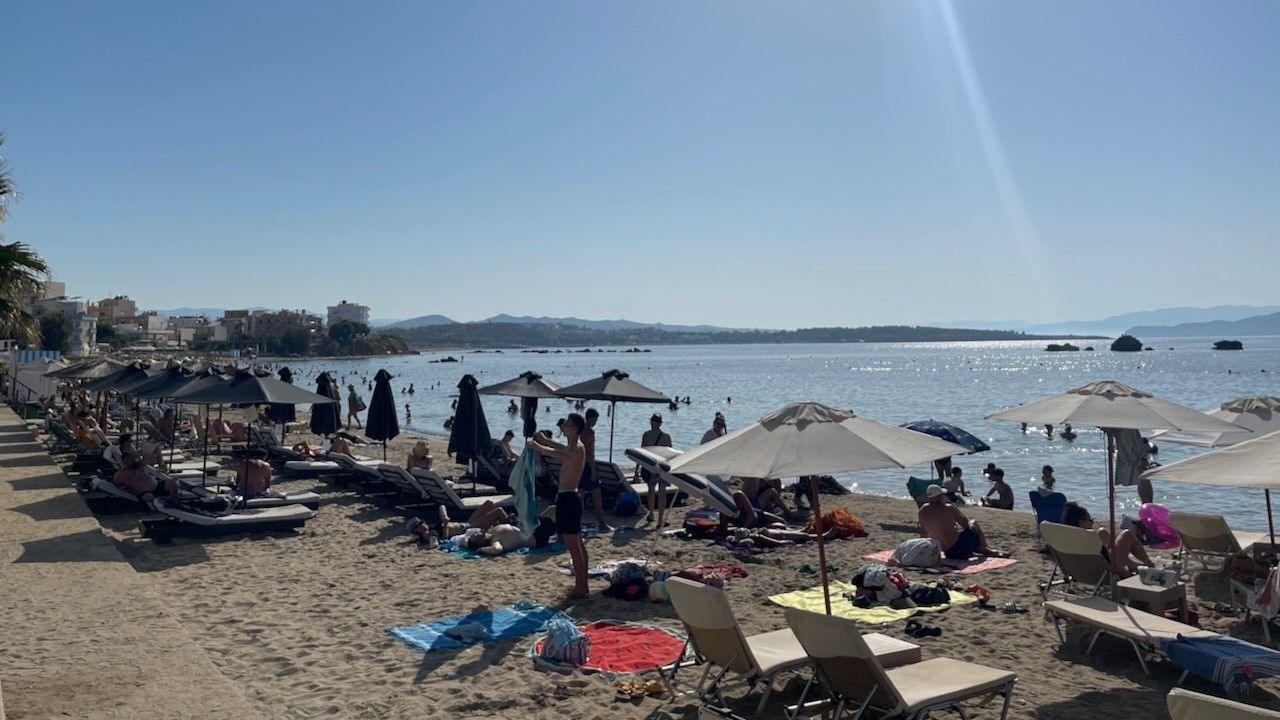 The beach at Chania with parasols and the sea